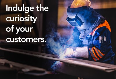 Worker welding in a factory. Heavy industry, welder work